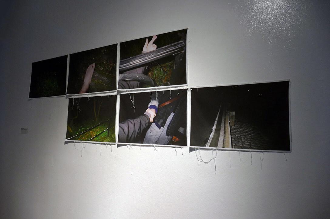 6 black pictures hanging on a white wall